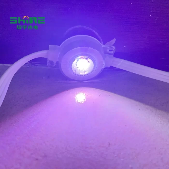 Close-up of purple RGB LED eaves light detail with smooth casing, showing vibrant light beads, placed on light surface