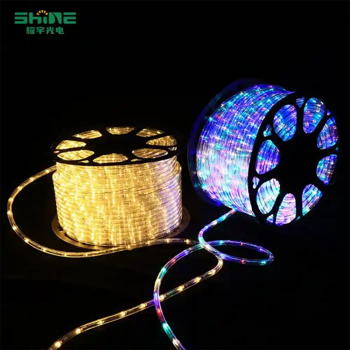 LED string lights in warm white and RGB colors arranged side-by-side, glowing vividly on a black background.