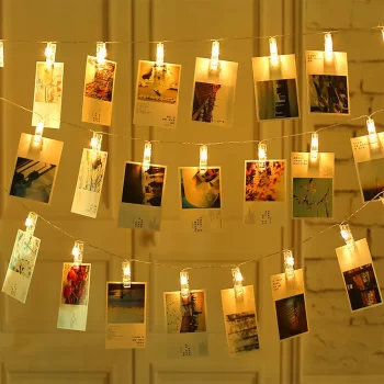 photo display lights illuminate postcards from friends around the world, casting a warm glow that transforms the room into a cozy private memory gallery