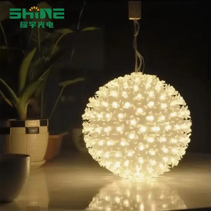 LED fairy lights for bedroom featuring hanging warm white flower balls; battery-powered glow creates a floating magical ambience.