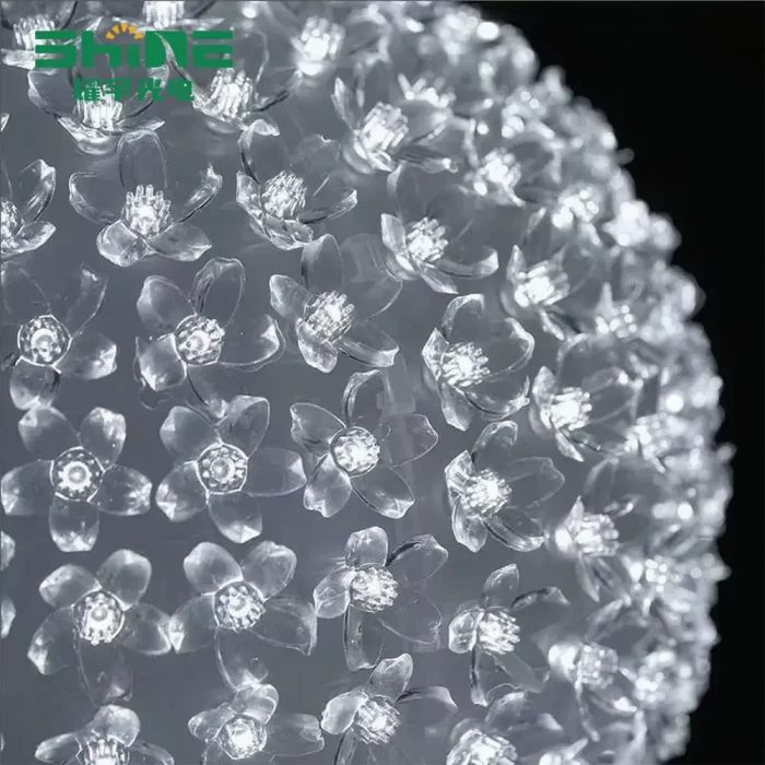 LED fairy lights for bedroom featuring a close-up of pure white clear flower balls; battery-powered for adding clean, refined romantic ambiance.