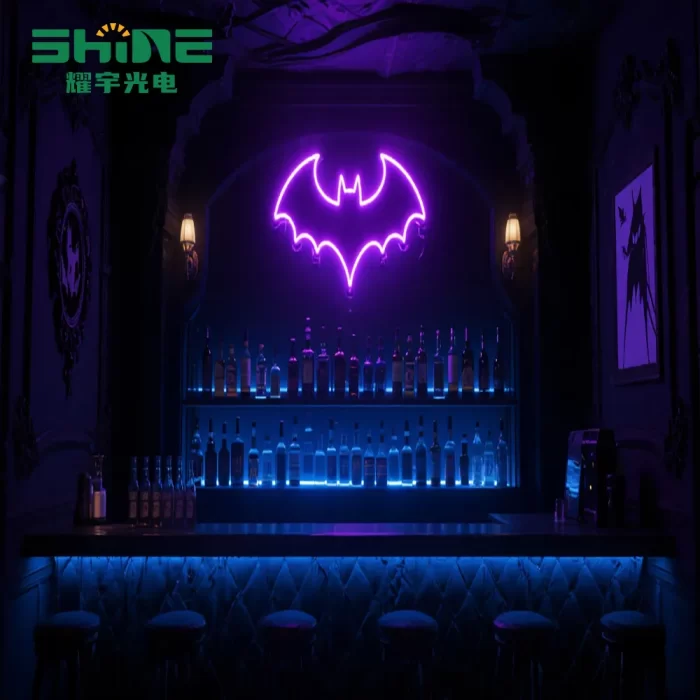 Purple bat LED neon sign above bar shelves in gothic nightclub interior, wholesale bar décor lighting.
