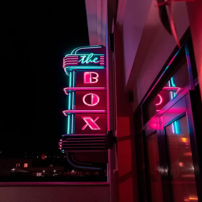 Commercial LED neon sign wholesale for building exterior branding, used by retailers and event planners seeking large-scale illuminated signage.
