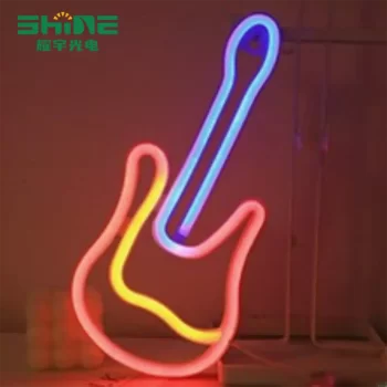 Wall-mounted guitar neon decorative light in tri-color design for cafés and nightclubs.