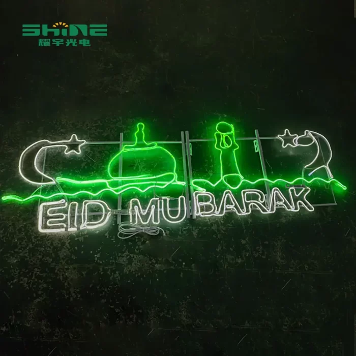 2D rendering of `Happy Eid Mubarak` LED lights with white and green crescent, star and mosque dome on dark background.