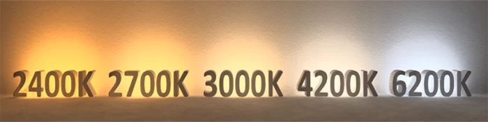 LED color temperature comparison: Lighting effects of 2400K, 2700K, 3000K, 4200K, and 6200K on a wall (from warm yellow to cool white)
