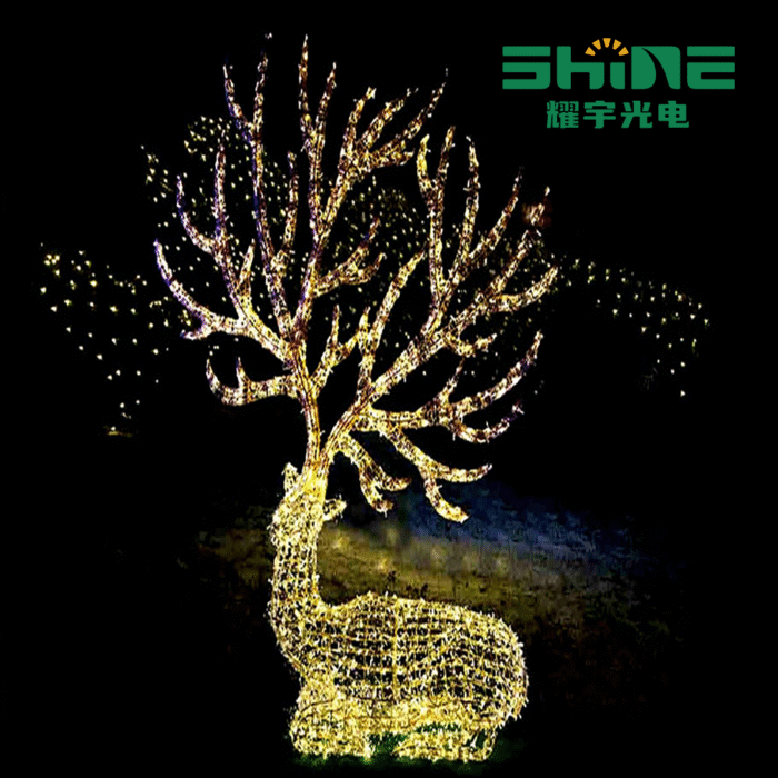 An elegant 3D light display of a deer with tree-like antlers, adorned with twinkling LED lights in yellow and purple, set against a dark background, creating a magical, festive scene.