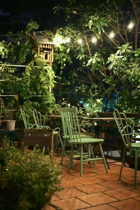 Outdoor dining patio with Edison bulb string lights overhead