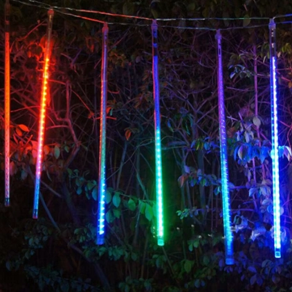 RGB meteor shower xmas lights with multicolor LED tubes for red, green, and blue cascading effects in outdoor landscaping