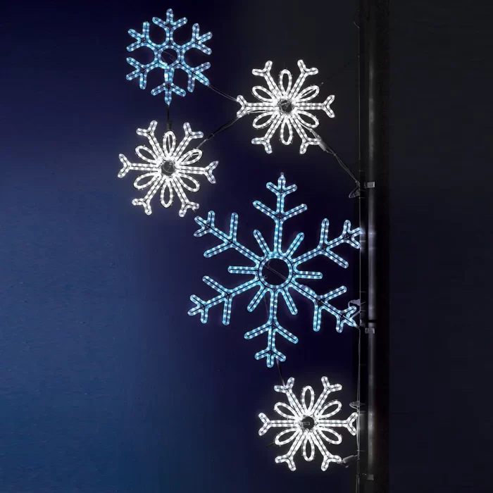 Blue and white snowflake street pole motif set with multiple sizes for city holiday lighting programs