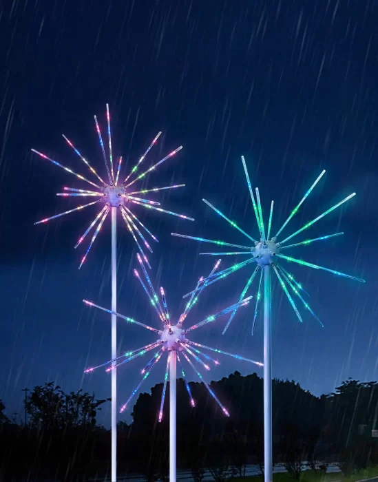 Outdoor firework Christmas lights operating in rainy weather with colorful LED starburst effects